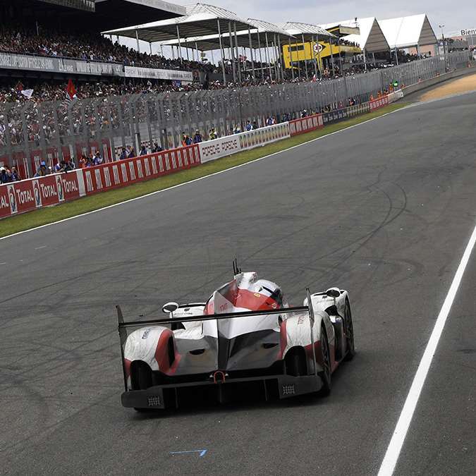 The Toyota TSO50 Hybrid N°5, driven by Japan's Kazuki Nakajima, is pictured at a standstill after it suffered engine failure, in the final lap of the 84th Le Mans 24-hours endurance race.